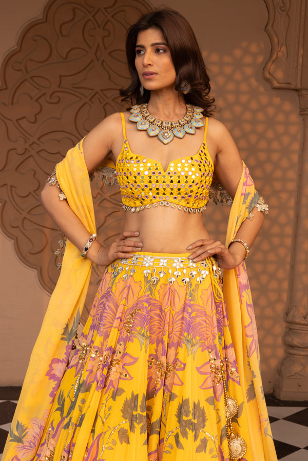 YELLOW FLORALS PRINTED LEHENGA WITH EMBROIDERED BUSTIER AND DUPATTA