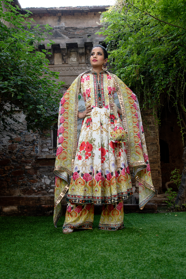 IVORY FLORAL PRINTED KALIDAR ANARKALI WITH POTLI BAG