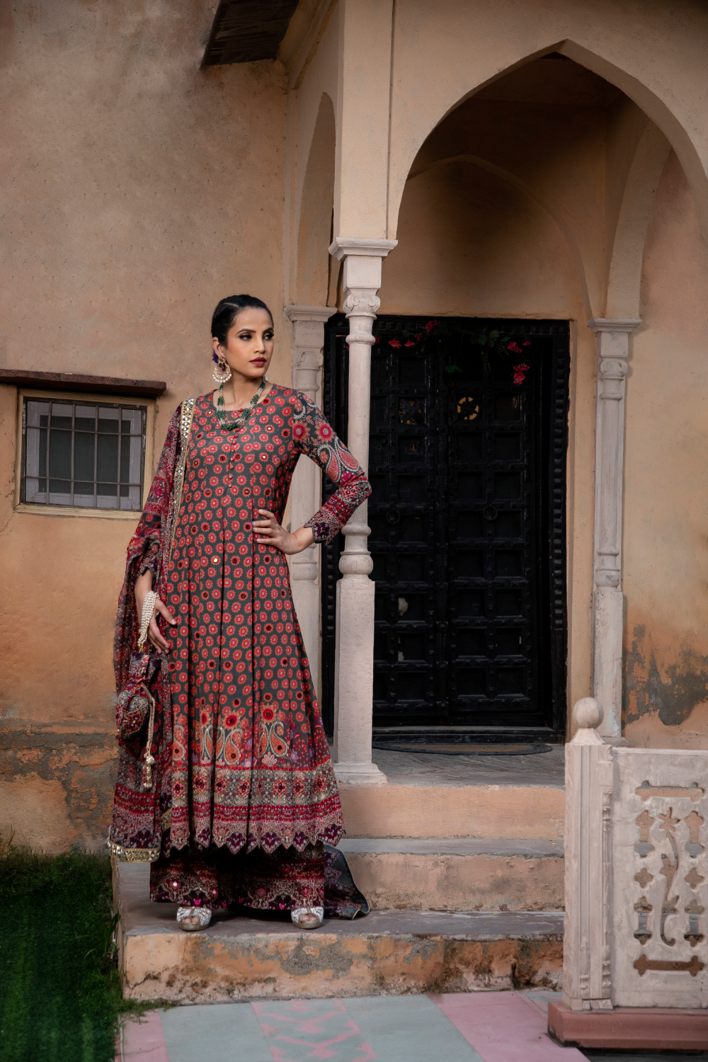 RED & GREEN PRINTED KALIDAR ANARKALI SET WITH POTLI BAG